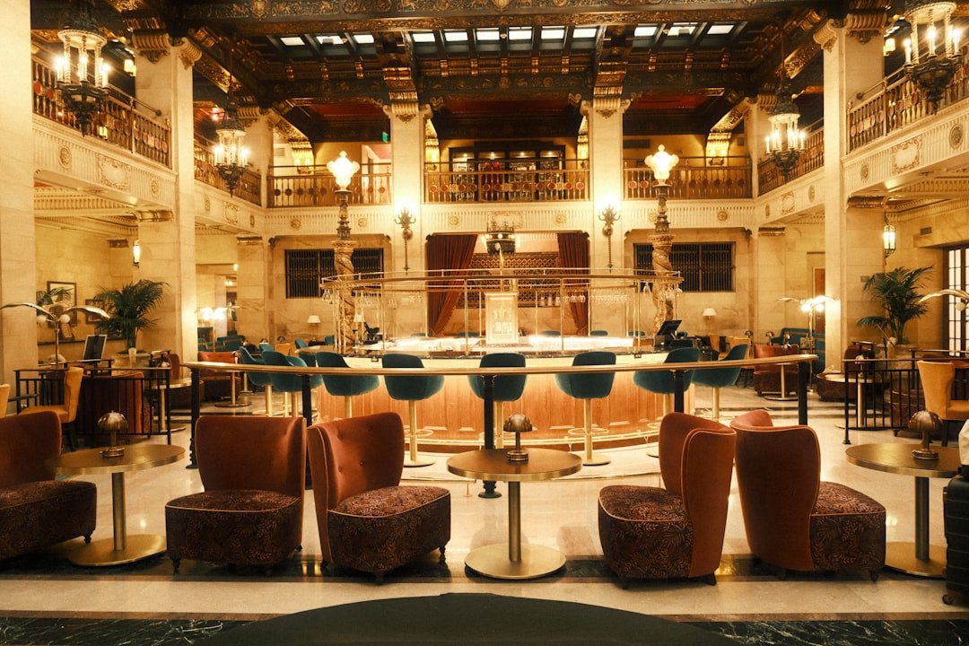 Hotel in Borgata Hotel Casino & Spa - A large lobby with a lot of chairs and tables