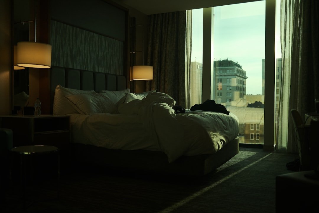 Hotel in Harrah's Resort Atlantic City - a bedroom with a large bed and a large window